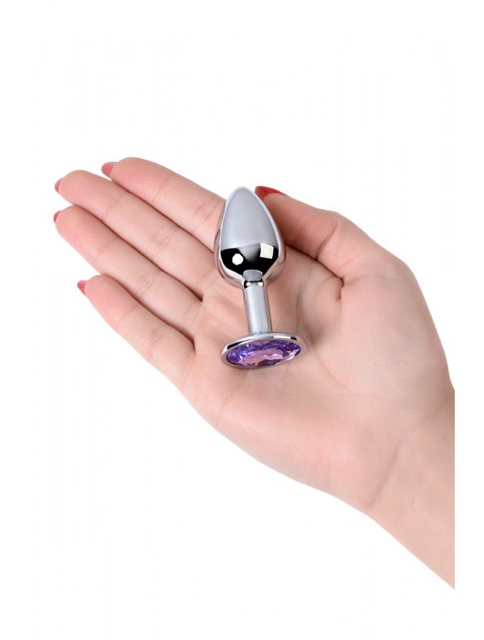Серебристая конусовидная анальная пробка с фиолетовым кристаллом - 7 см. - ToyFa - купить с доставкой в Челябинске